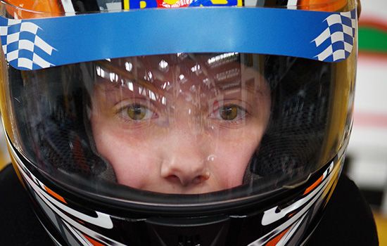 kid in racing helemt Go-Kart Prices